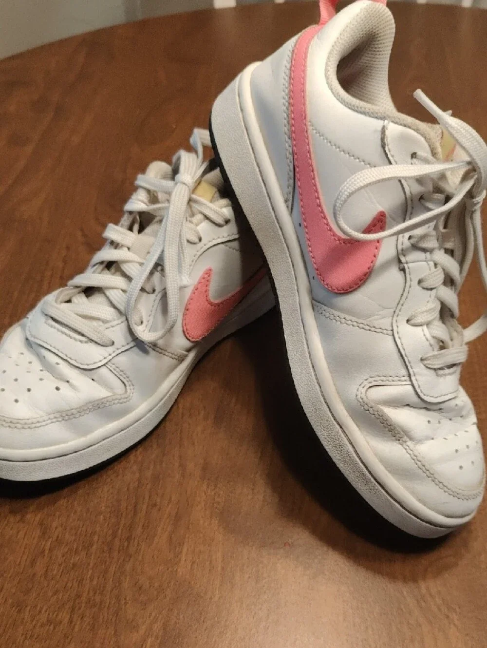 Nike White Low-Top Sneakers with Pink Swoosh